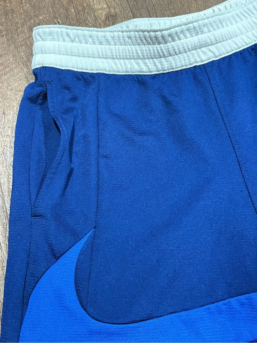 Nike Royal Blue Kids Athletic Shorts with Light Blue Swoosh and White Waistband
